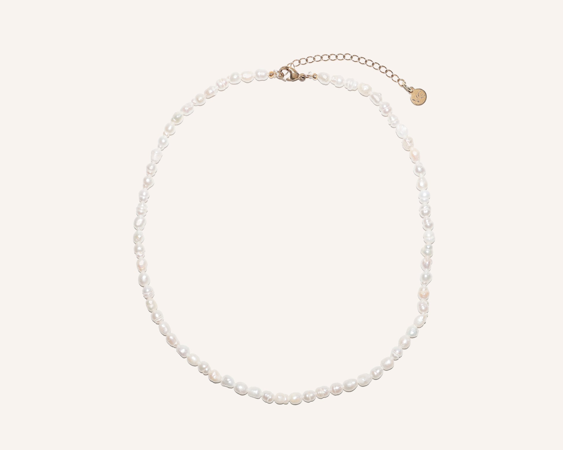 Pearl necklace on a white background